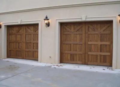custom-solid-wood-sliding-garage-doors-beige-exterior